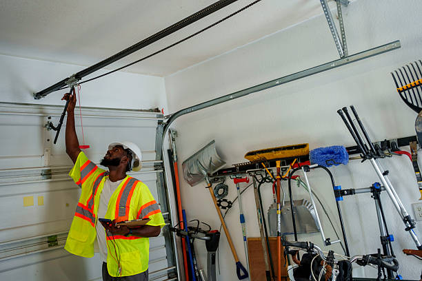 Professional Garage Door Panel Replacement technician working in Larned, KS