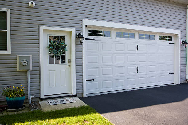 24/7 Emergency Garage Door Panel Replacement experts in Larned, KS